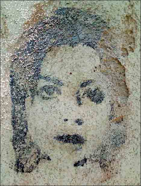 portrait on stucco
