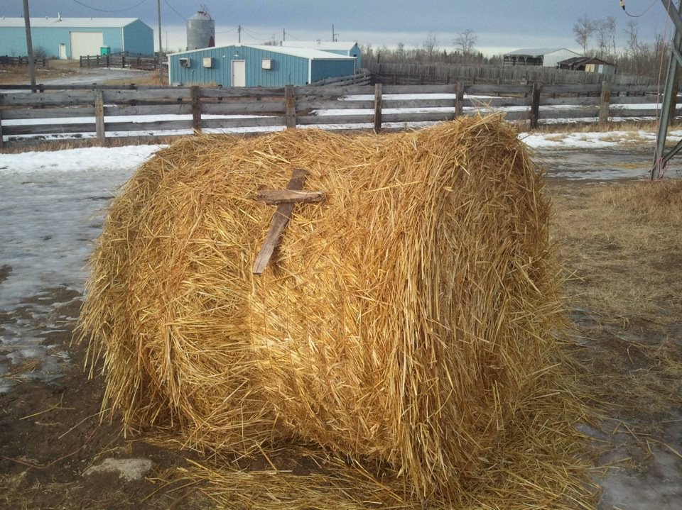christian bale cross crucifix hay