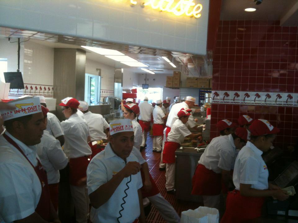 in and out burger staff workers behind counter double double